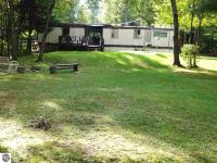 11391 SW Henschell Road, Fife Lake, MI 49633