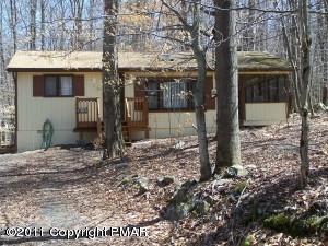 Small price...but has 4 bedrooms and screen porch in Arrowhead Lakes