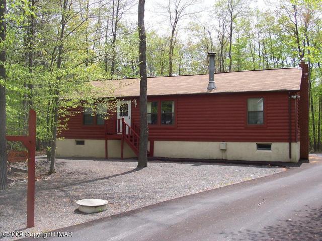 Always dreamed of a log home in the Poconos?  Well check this one out...